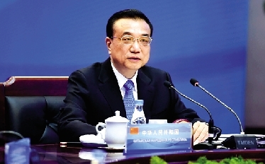 李克強總理15日上午在鄭州國際會展中心主持上合總理會小范圍會談